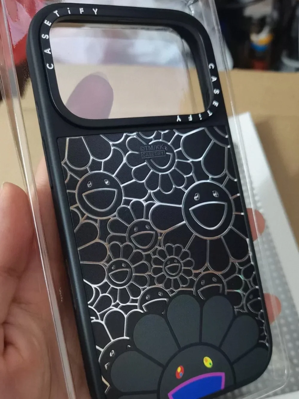 Casetify Black Embossed Smiley Flower Phone Case with Color Accent